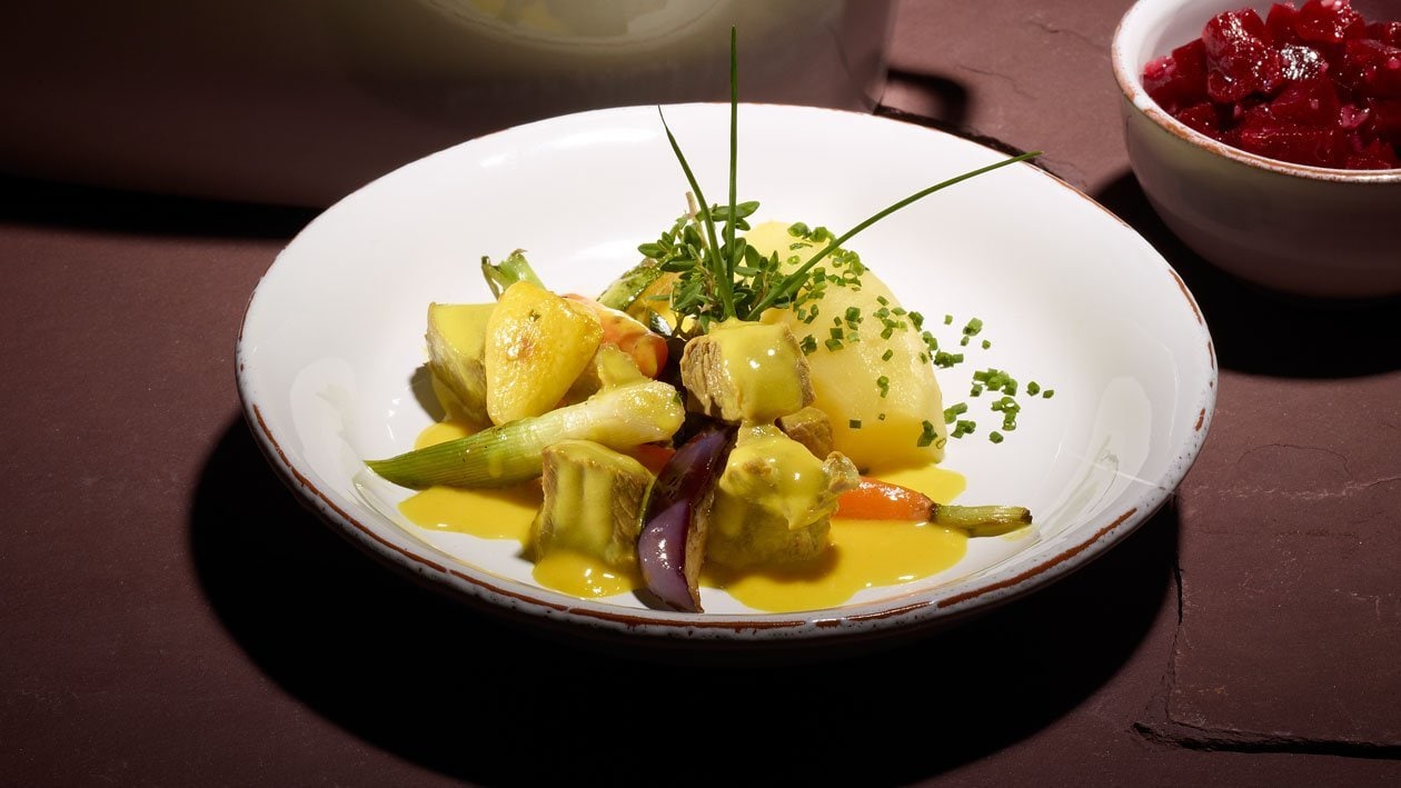 Ragoût d'agneau à l'Eemmental - pommes nature et salade de carottes rouges