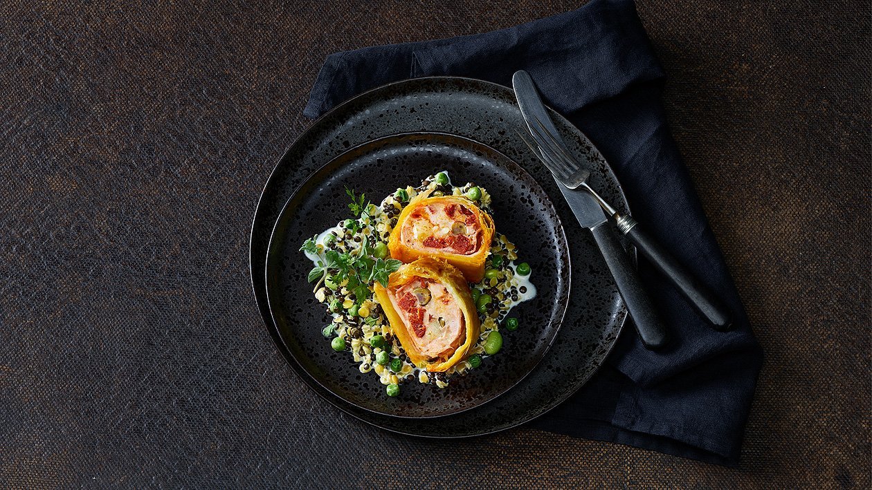 Fromage d'Italie à l'espagnole, en manteau de pâte feuilletée, lentilles et petits pois