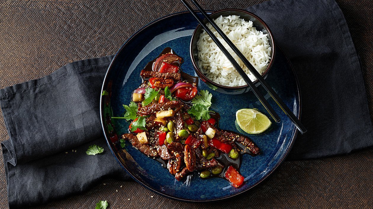 Zarte Rindfleischstreifen aus dem Wok mit Basmati-Reis Zarte Rindfleischstreifen aus dem Wok mit Basmati-Reis