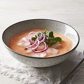 Essence de crustacés et son carpaccio de noix de St-Jacques