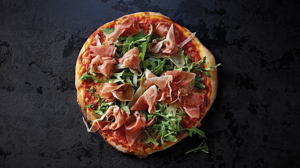 Pizza con rucola e prosciutto di Parma –  