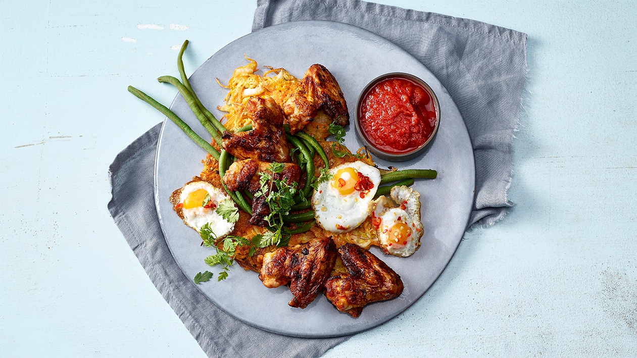 Aargauer Rüeblitätschli mit Pouletflügeli und Chili-Eier