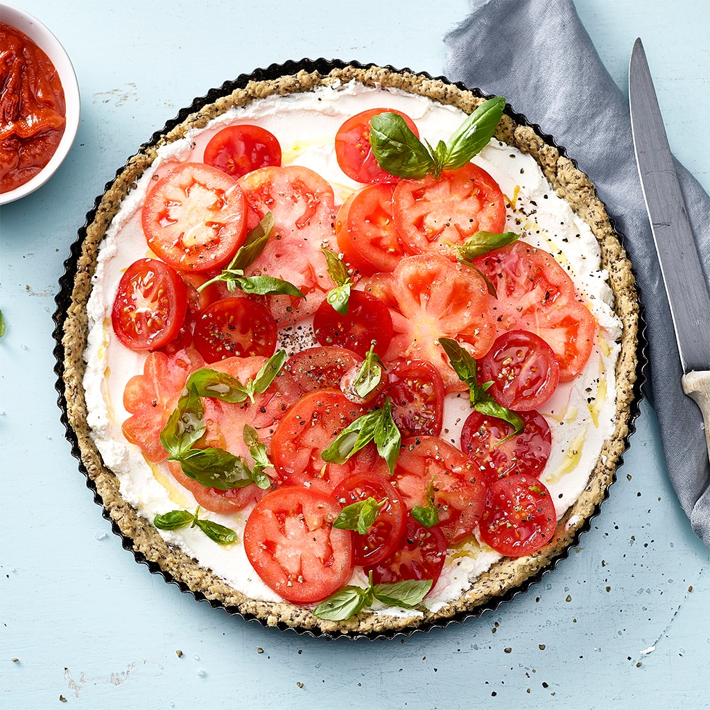 Tarte à la tomate et Ricotta sur une pâte de flocons d'avoine et dip à la tomate