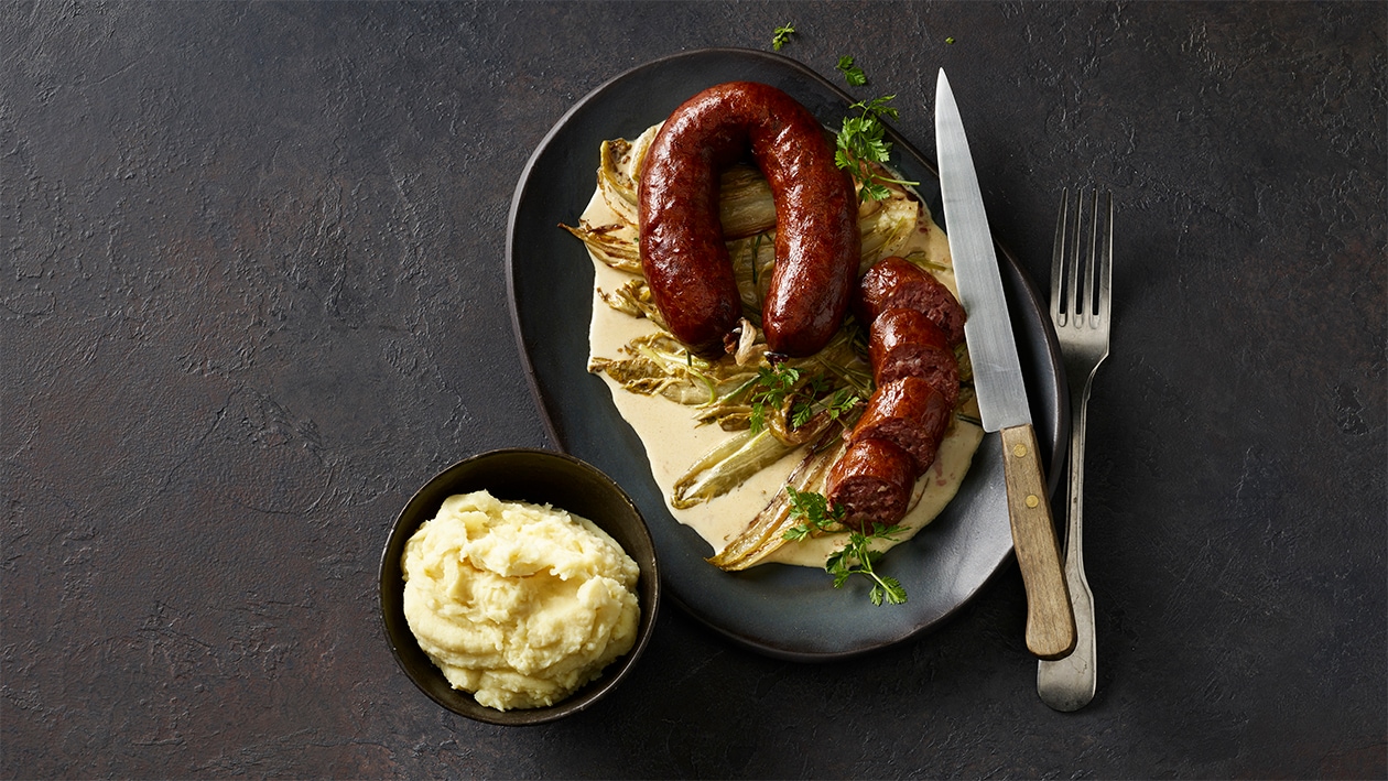 Saucisse neuchâteloise aux poireaux et endives –  