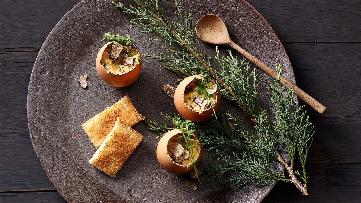 Oeufs brouillés des poules de ferme luzernoises aux truffes noires –  