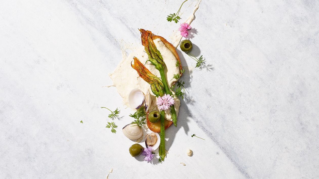 Pain tessinois aux fleurs de courgettes et palourdes –  