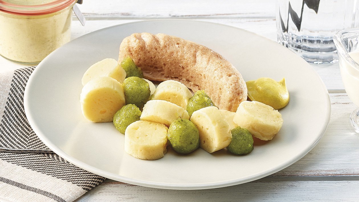 Cervelas grillé et salade de pommes de terre sous forme de purée