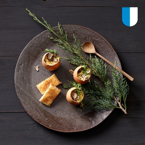 Œufs brouillés des poules de ferme luzernoises aux truffes noires