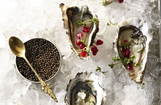 Huîtres avec vinaigrette aux agrumes et graines de grenade